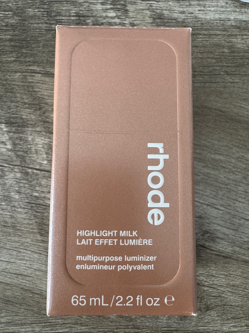 RHODE Highlight Milk Multipurpose Luminizer - Rose Gold Tone. Shade 3